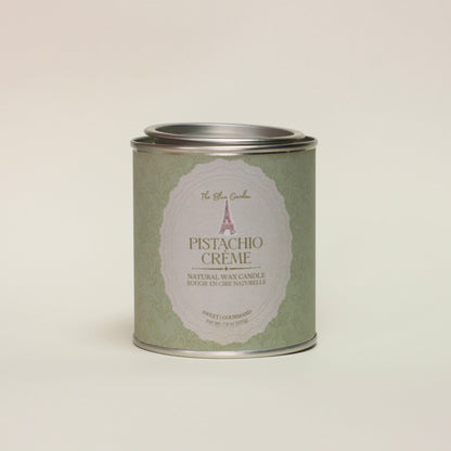 Can of pistachio creme on a light beige background